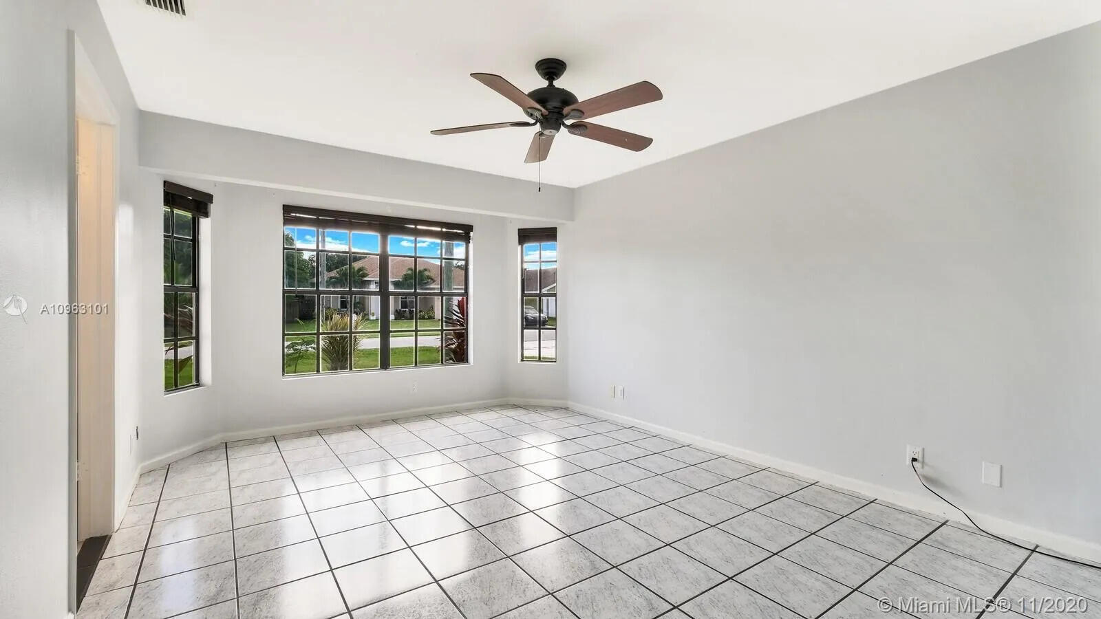 6048 Garrett Street Jupiter, FL 33458 - Photo 23 of 39 a view of an empty room with a window