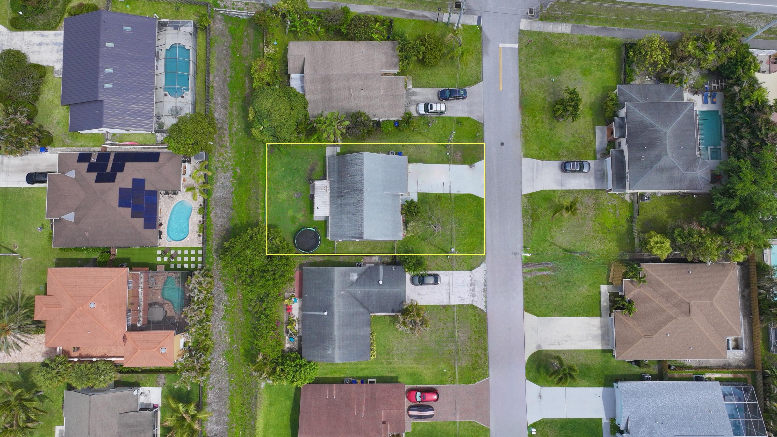 6048 Garrett Street Jupiter, FL 33458 - Photo 3 of 35 dji_fly_20260330_141044_0029_17748950614
