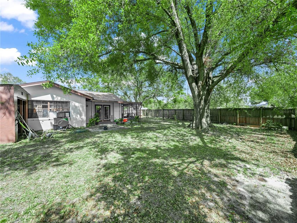4601 Granada Boulevard Sebring, FL 33872 - Photo 14 of 19 a front view of a house with a garden