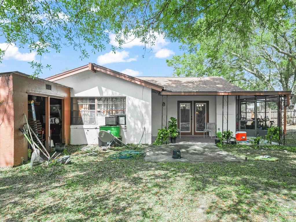 4601 Granada Boulevard Sebring, FL 33872 - Photo 15 of 19 a front view of a house with garden