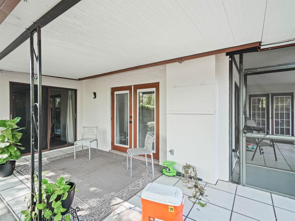 4601 Granada Boulevard Sebring, FL 33872 - Photo 18 of 19 a backyard of a house with outdoor seating