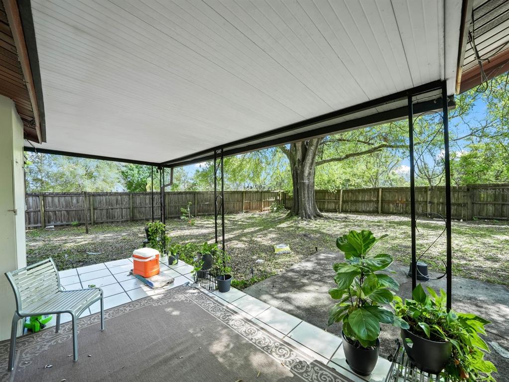 4601 Granada Boulevard Sebring, FL 33872 - Photo 19 of 19 a garden view with a sitting space