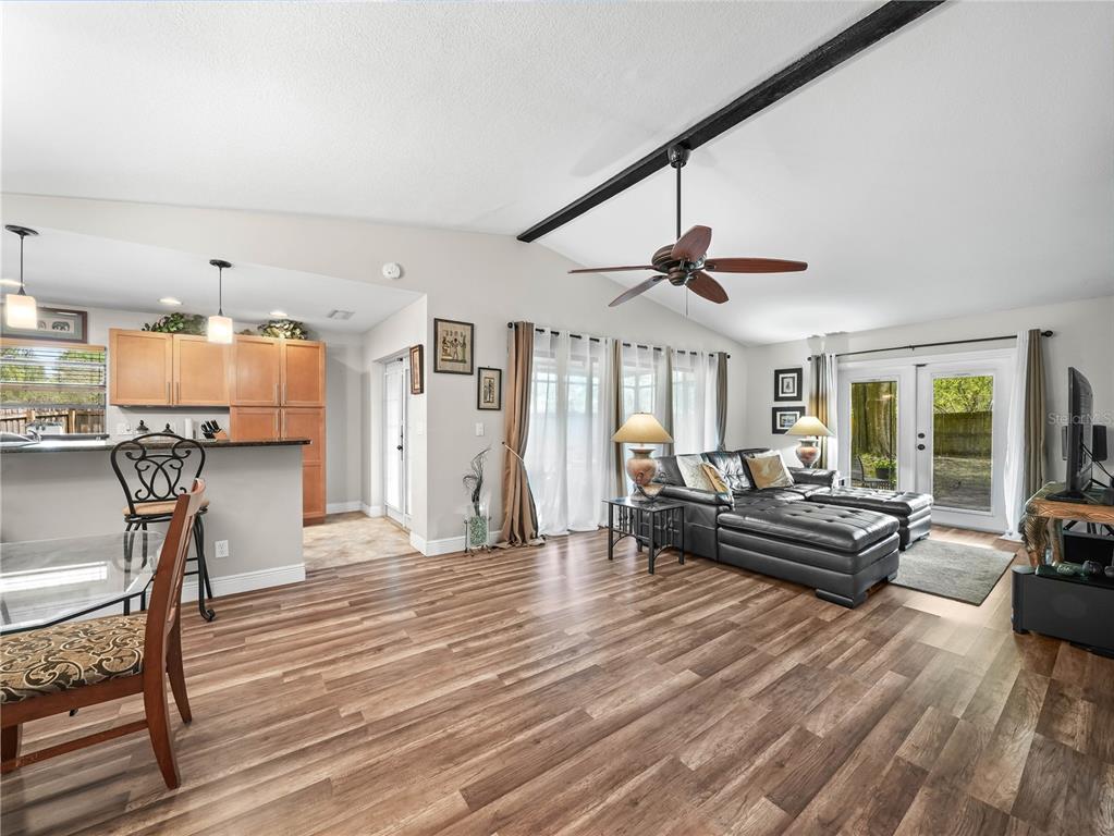 4601 Granada Boulevard Sebring, FL 33872 - Photo 3 of 19 a living room with furniture and a wooden floor