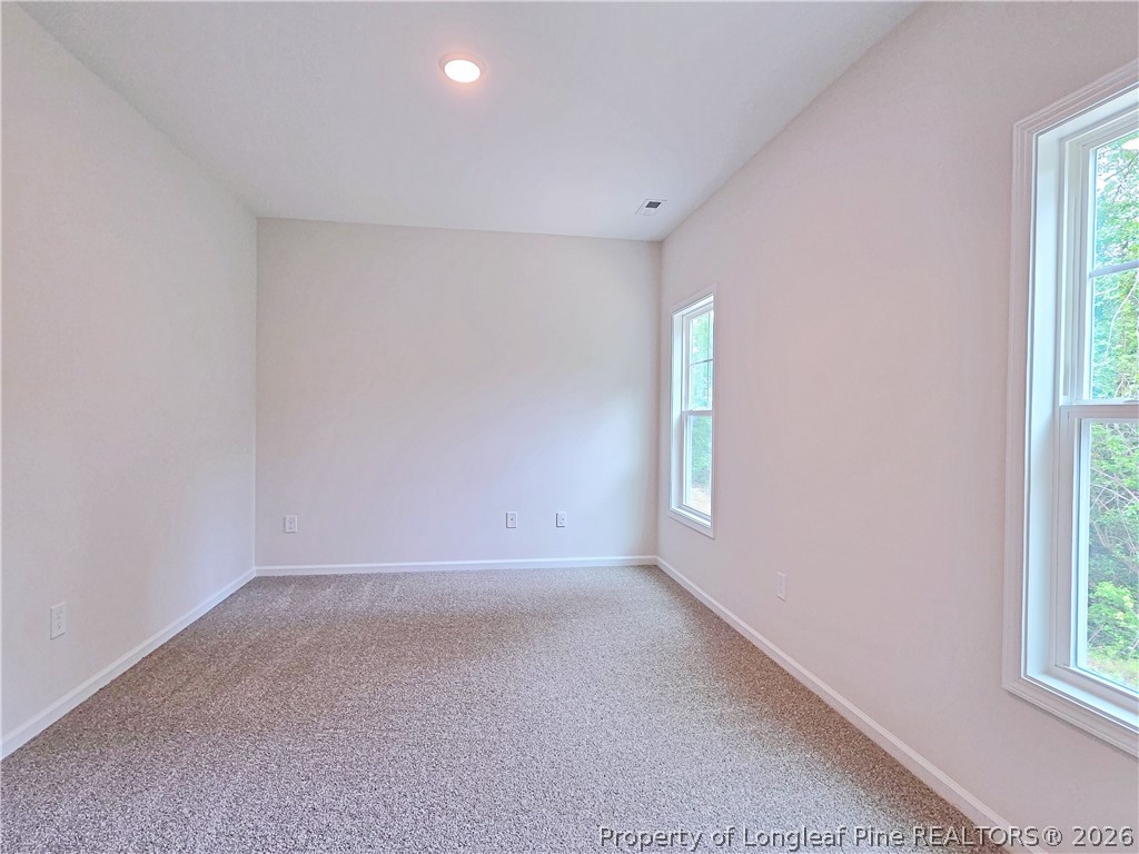 331 Appaloosa Drive Spring Lake, NC 28390 - Photo 12 of 29 an empty room with windows