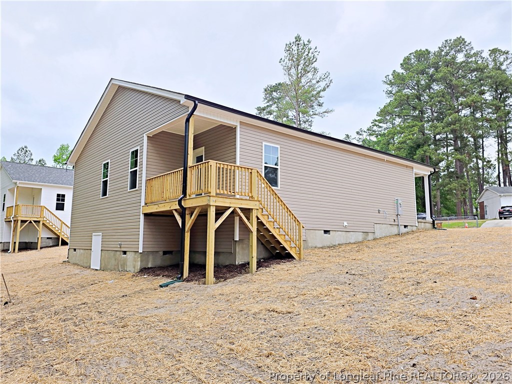 331 Appaloosa Drive Spring Lake, NC 28390 - Photo 26 of 29 a view of a house with a yard