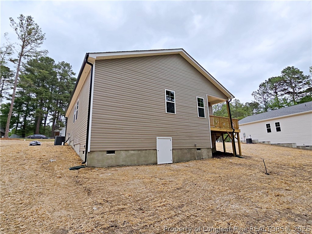 331 Appaloosa Drive Spring Lake, NC 28390 - Photo 29 of 29 a view of a house with a yard