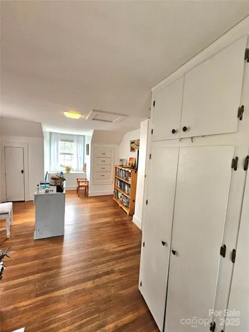 a backyard of a house with trees and houses