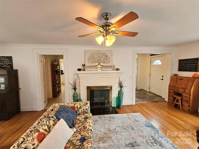 a bedroom with a bed and a fireplace