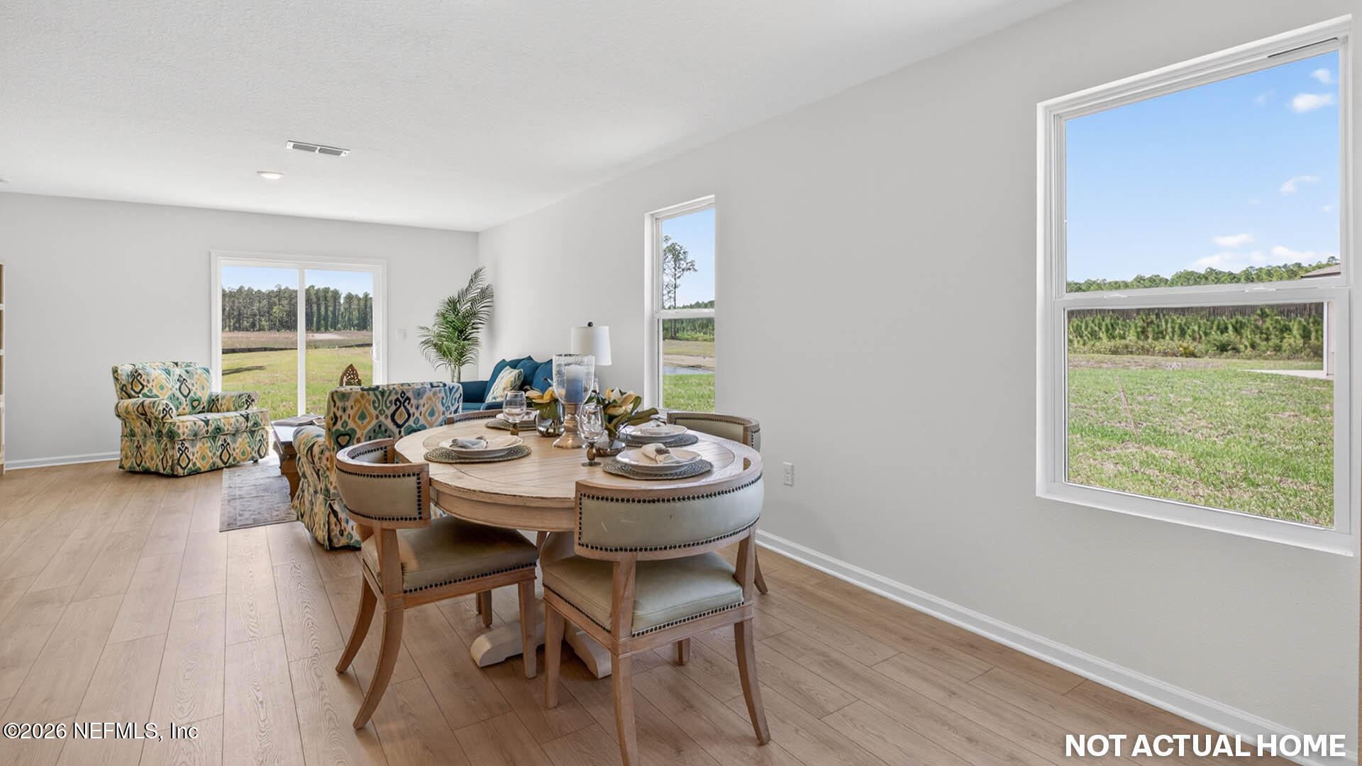 12095 Yew Tree Road Jacksonville, FL 32218 - Photo 6 of 61 a view of a dining room with furniture window and outside view