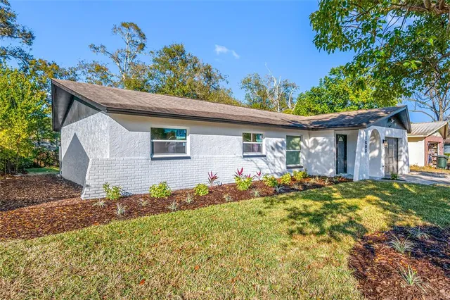 front view of a house with a big yard