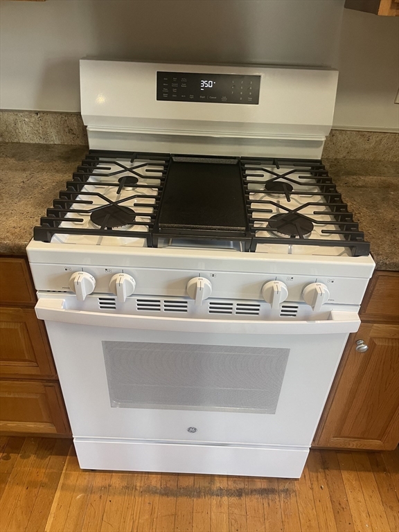 4 Blaney Street, Unit 2 Swampscott, MA 01907 - Photo 19 of 24 a close view of stove top oven