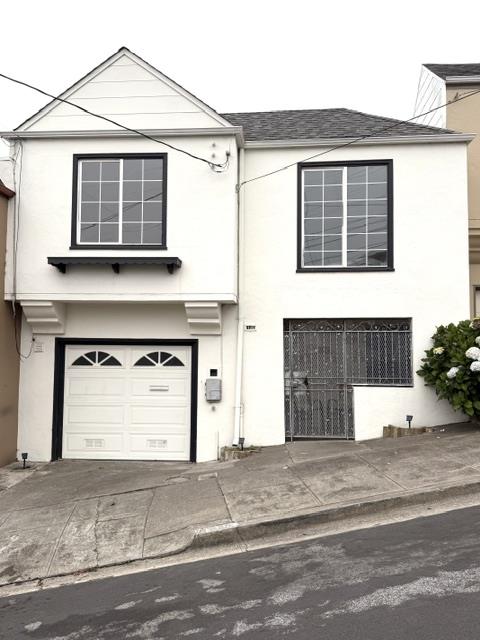 135 Bepler Street Daly City, CA 94014 - Photo 25 of 34 a view of a house with a garage