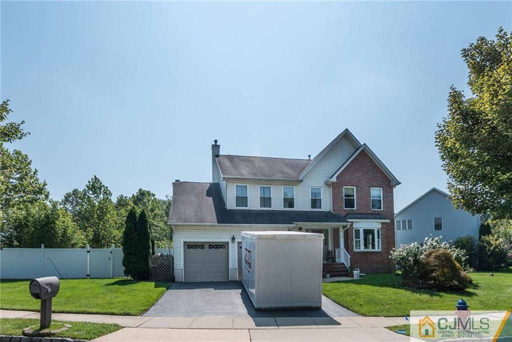 25 Crescent Road Old Bridge, NJ 08857 - Photo 1 of 25 a front view of a house with a yard and trees