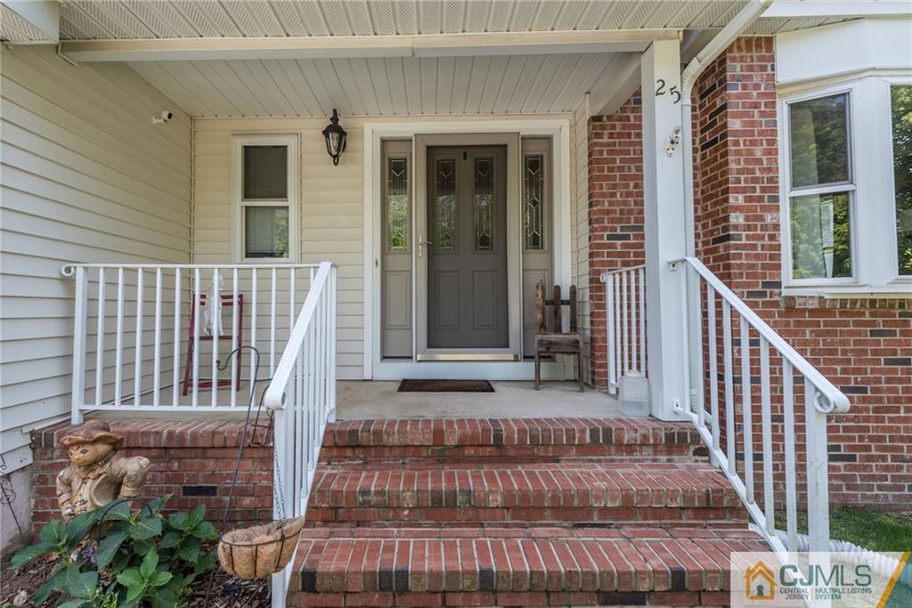 25 Crescent Road Old Bridge, NJ 08857 - Photo 2 of 25 a view of a brick house with wooden floor and windows