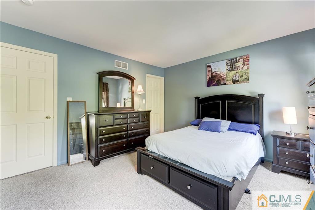 25 Crescent Road Old Bridge, NJ 08857 - Photo 18 of 25 a bedroom with a bed and a view of bedroom