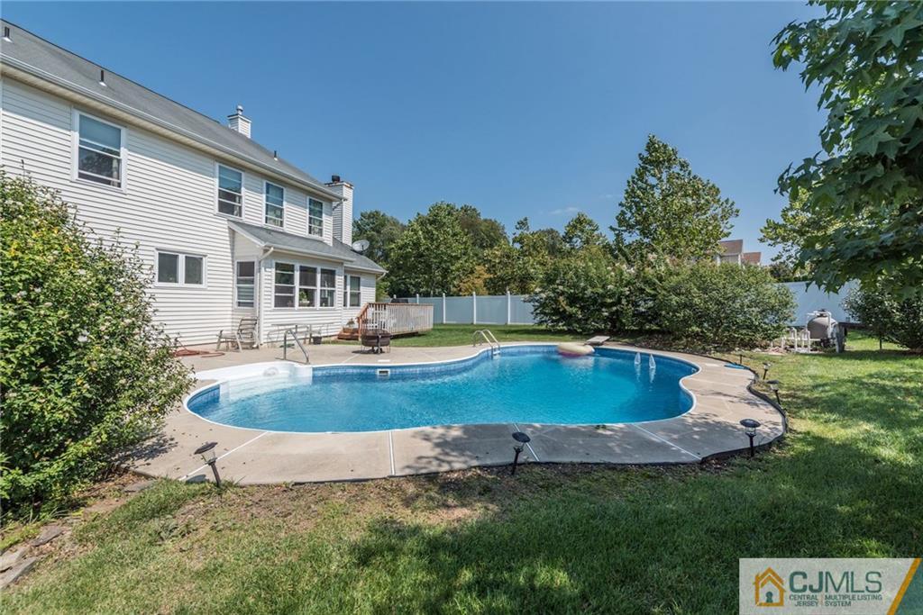 25 Crescent Road Old Bridge, NJ 08857 - Photo 23 of 25 a view of outdoor space yard and swimming pool