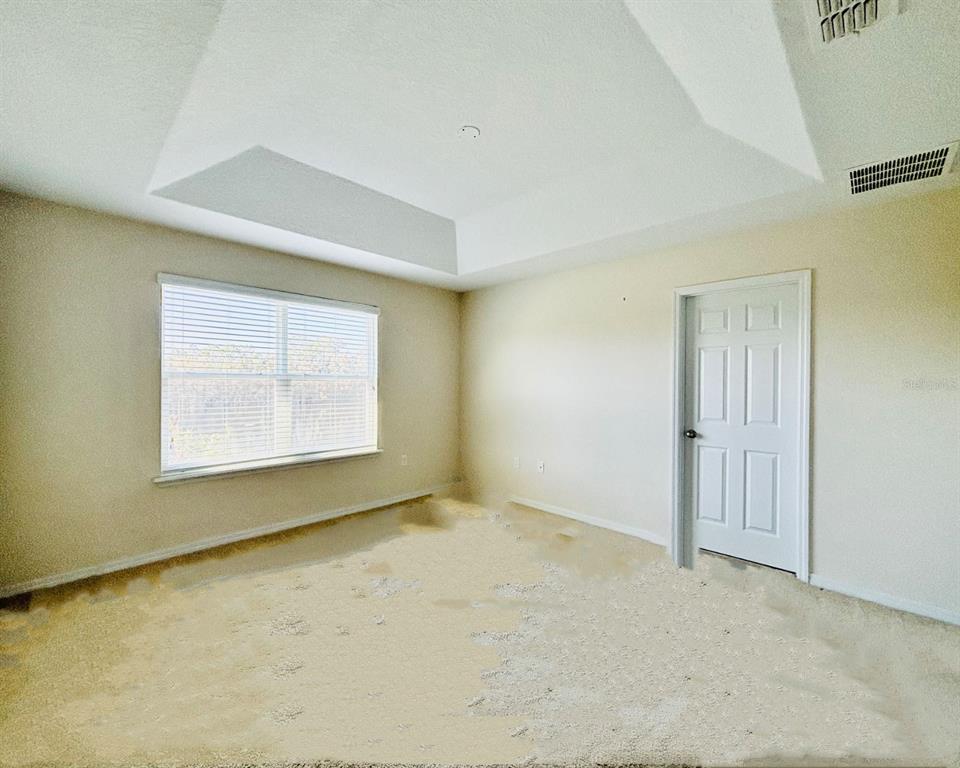 2144 Rookery Lane Sanford, FL 32773 - Photo 19 of 41 an empty room with windows