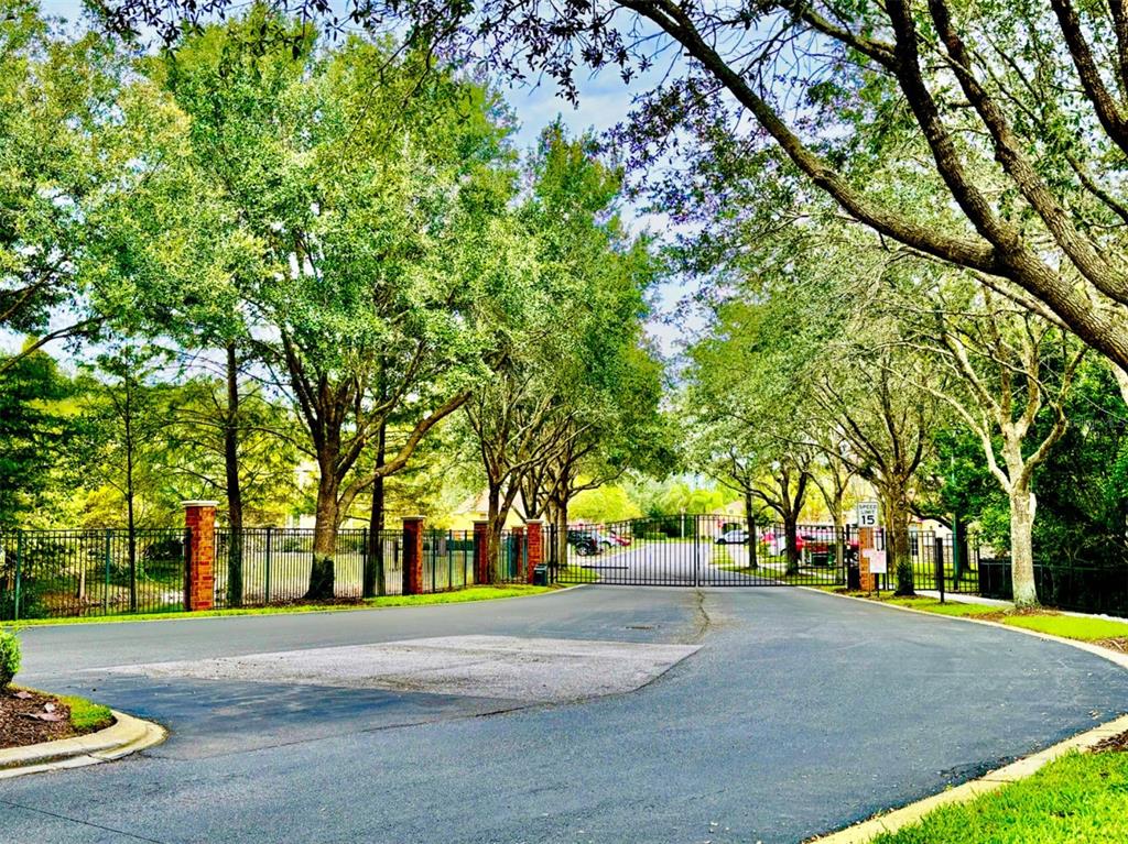 2144 Rookery Lane Sanford, FL 32773 - Photo 2 of 41 a view of street with trees