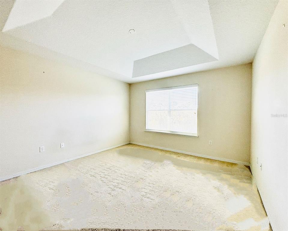 2144 Rookery Lane Sanford, FL 32773 - Photo 21 of 41 an empty room with a chandeliers fan