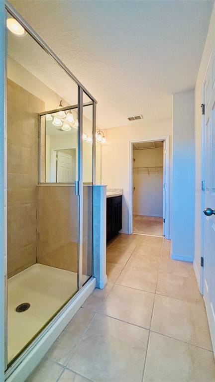 2144 Rookery Lane Sanford, FL 32773 - Photo 23 of 41 a bathroom with a bathtub and shower
