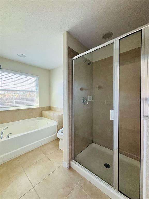 2144 Rookery Lane Sanford, FL 32773 - Photo 24 of 41 a bathroom with a shower and a bathtub