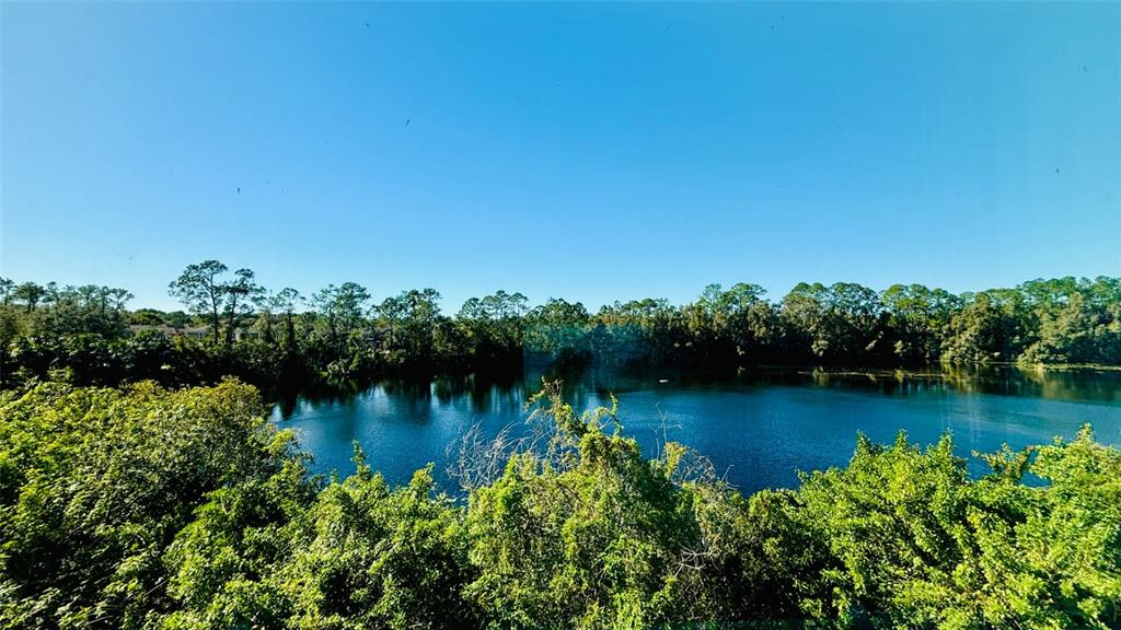 2144 Rookery Lane Sanford, FL 32773 - Photo 35 of 41 an aerial view of residential houses with outdoor space and lake view