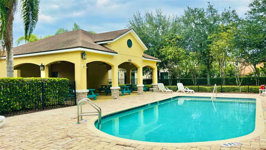 2144 Rookery Lane Sanford, FL 32773 - Photo 4 of 41 a view of a house with a swimming pool