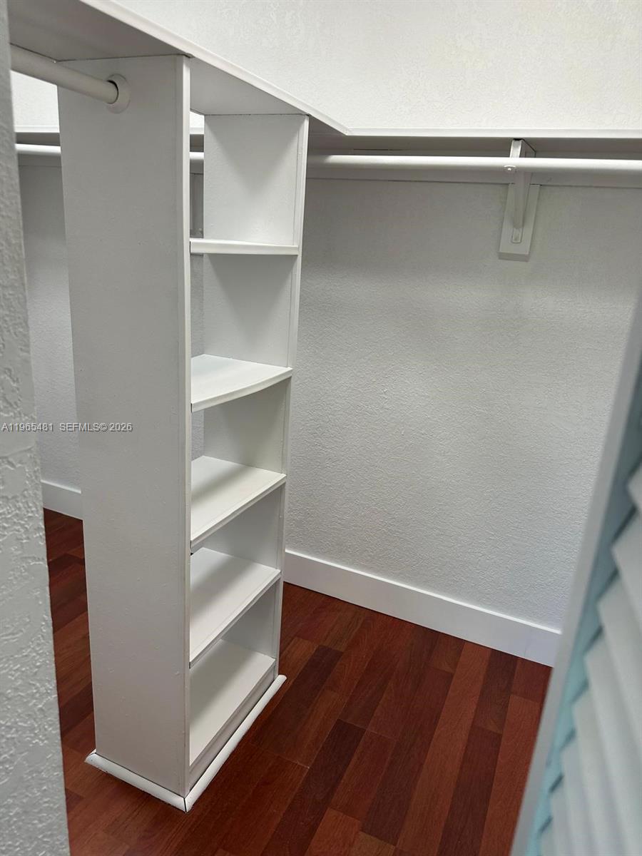 10916 Southwest 70th Terrace Miami, FL 33173 - Photo 18 of 39 a view of an empty walk in closet