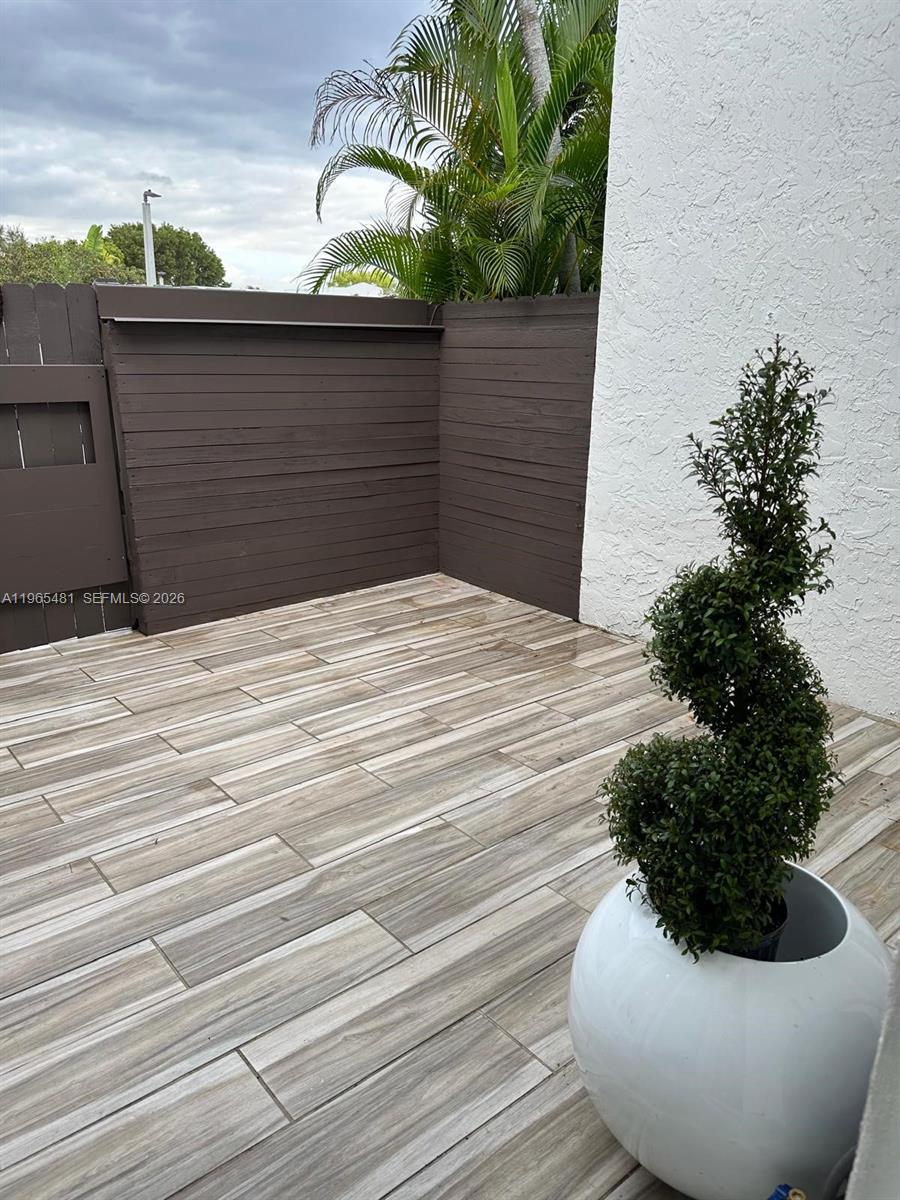 10916 Southwest 70th Terrace Miami, FL 33173 - Photo 3 of 39 a vase of flowers sitting on a table