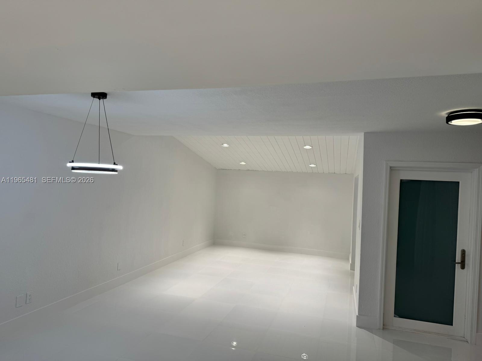 10916 Southwest 70th Terrace Miami, FL 33173 - Photo 5 of 39 a view of a room with a empty space