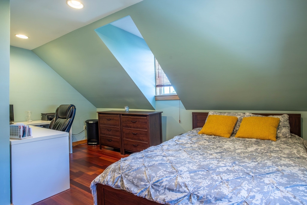 3642 Pawtucket Avenue Riverside, RI 02915 - Photo 30 of 39 a bed room with a bed and a dresser
