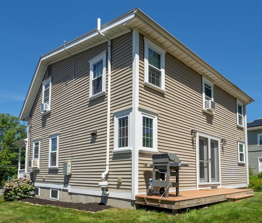 3642 Pawtucket Avenue Riverside, RI 02915 - Photo 39 of 39 a front view of a house with a yard