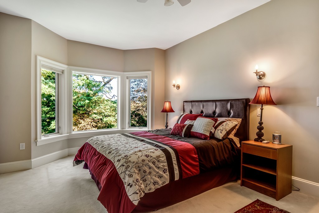 36 Sky View Circle Newton, MA 02459 - Photo 12 of 29 a bedroom with bed and a window