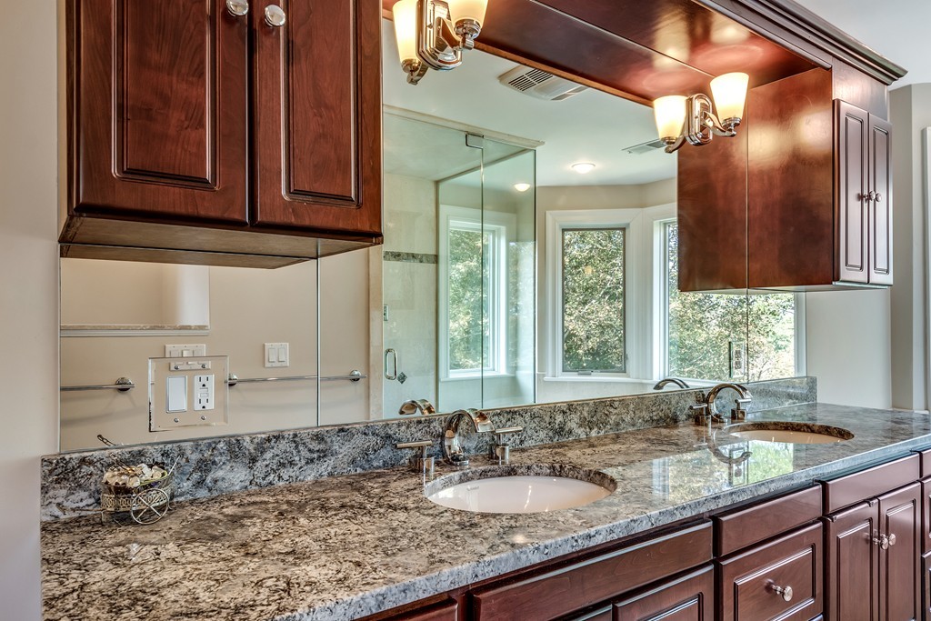 36 Sky View Circle Newton, MA 02459 - Photo 18 of 29 a bathroom with a sink and a mirror