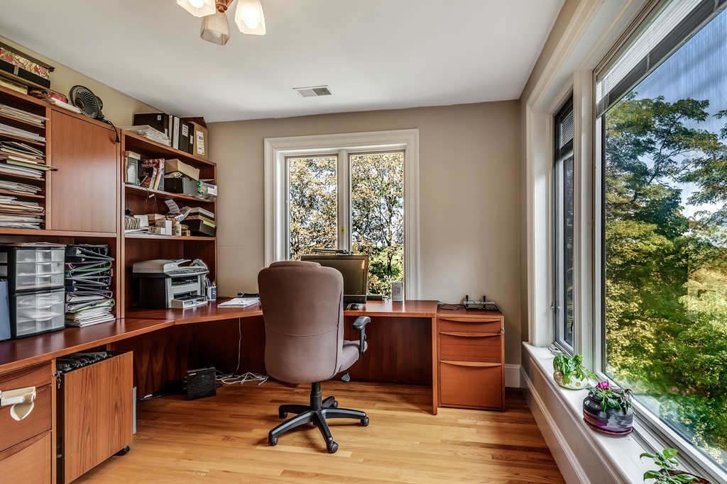 36 Sky View Circle Newton, MA 02459 - Photo 19 of 29 a view of a workspace with furniture and a window