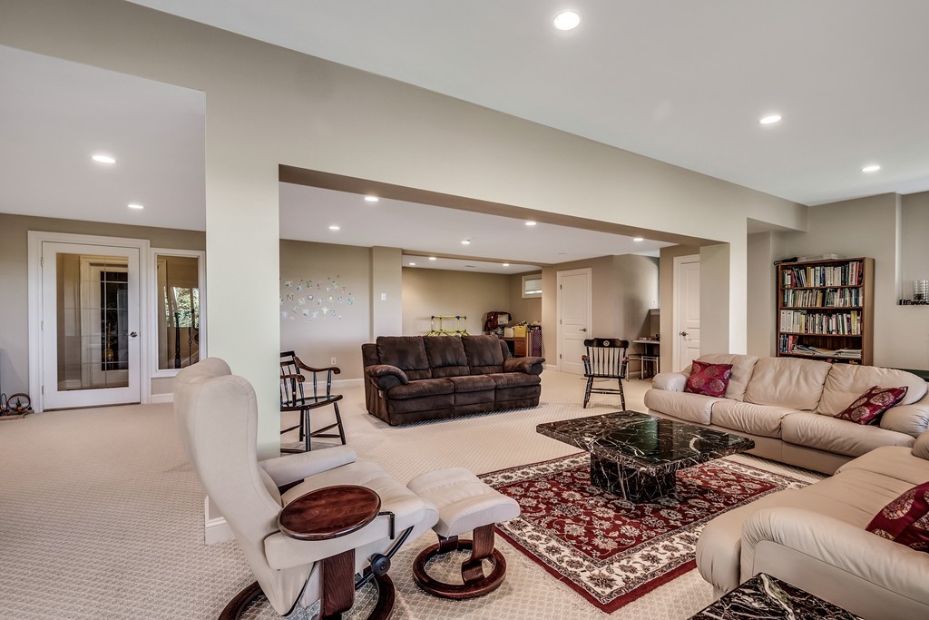 36 Sky View Circle Newton, MA 02459 - Photo 25 of 29 a living room with furniture and a wooden floor