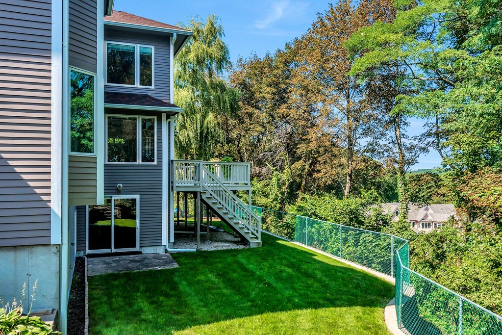 36 Sky View Circle Newton, MA 02459 - Photo 29 of 29 a view of an house with backyard space and garden