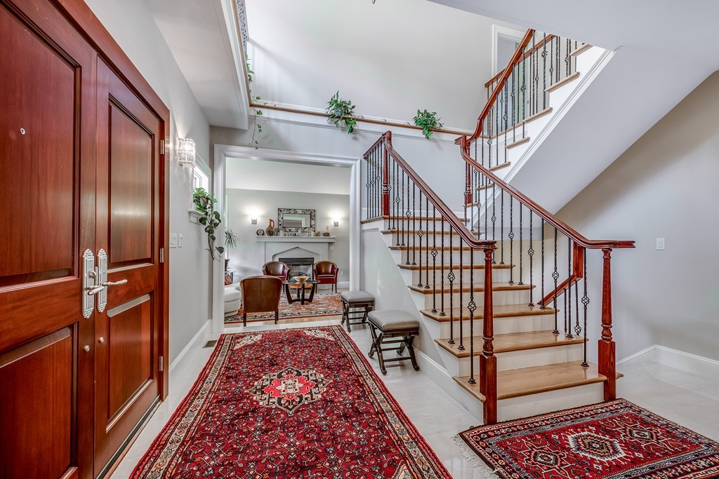 36 Sky View Circle Newton, MA 02459 - Photo 3 of 29 a view of entryway and hall with wooden floor