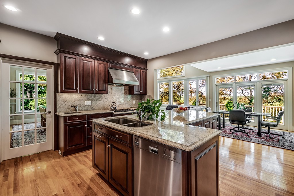 36 Sky View Circle Newton, MA 02459 - Photo 10 of 29 a kitchen with a stove sink and cabinets