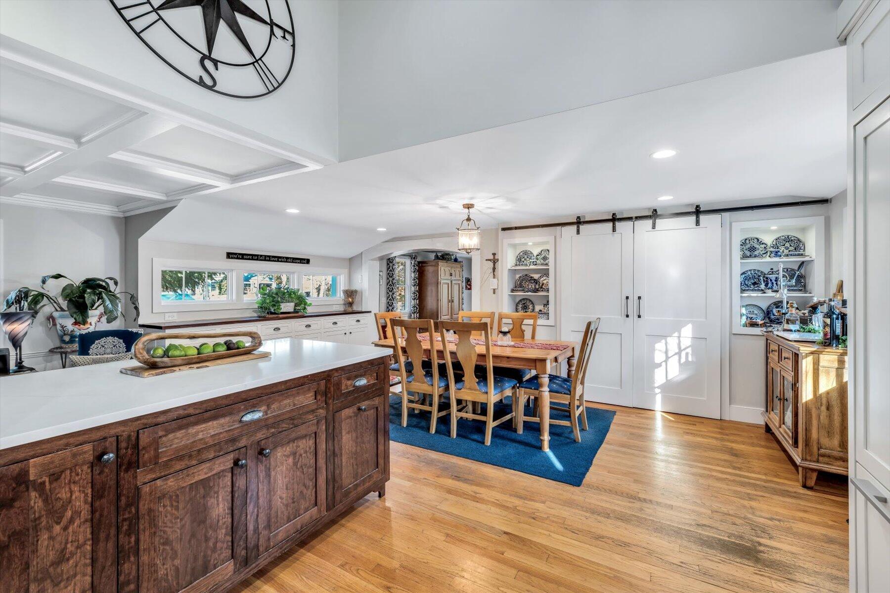 245 Lower County Road Harwich Port, MA 02646 - Photo 11 of 42 a large kitchen with lots of counter space and stainless steel appliances
