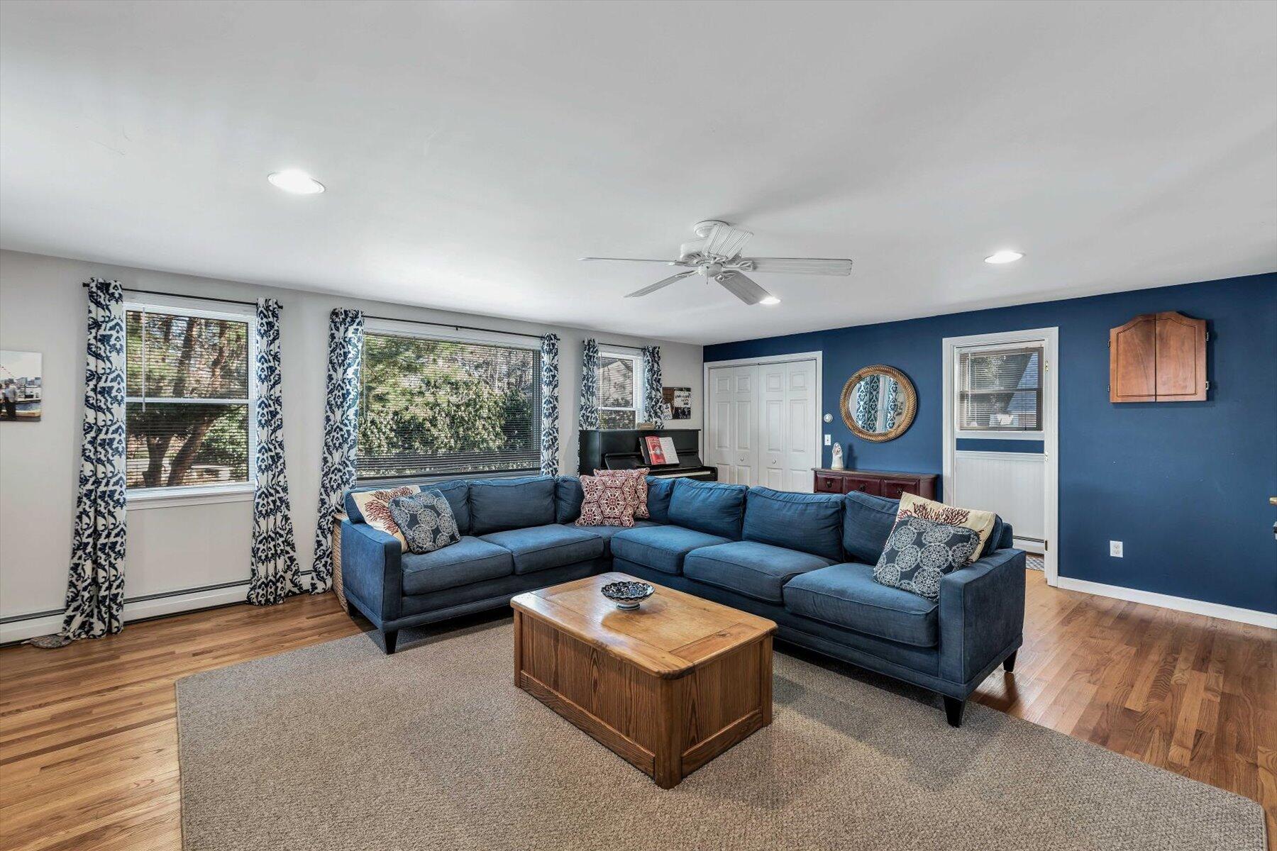 245 Lower County Road Harwich Port, MA 02646 - Photo 25 of 42 a living room with furniture and a large window