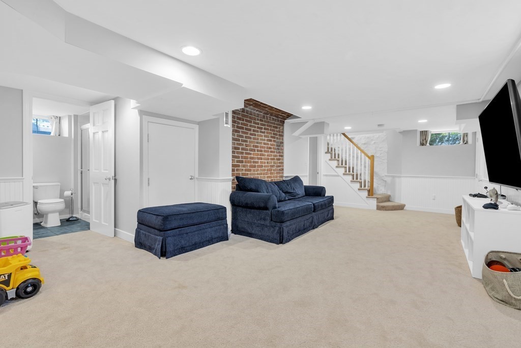 2 Hillcrest Road Marblehead, MA 01945 - Photo 31 of 38 a living room with furniture and a flat screen tv