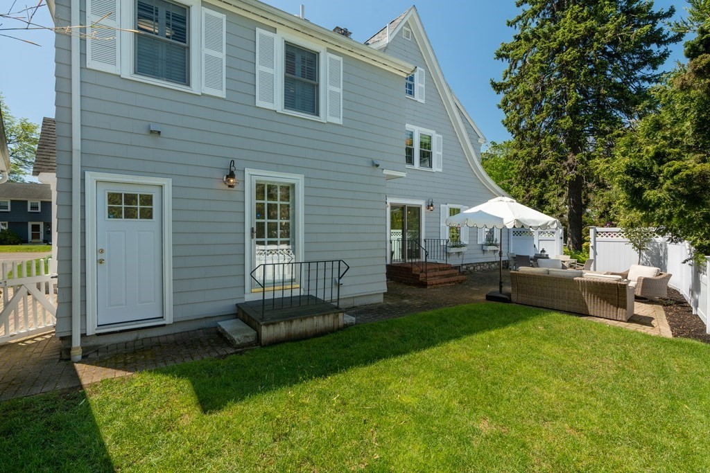 2 Hillcrest Road Marblehead, MA 01945 - Photo 34 of 38 a view of a house with a backyard and sitting area