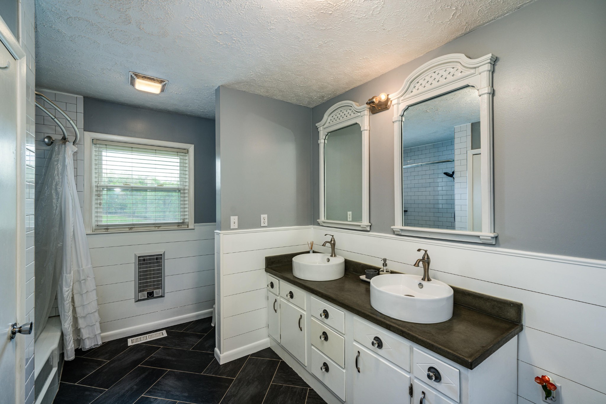 144 Meister Hills Road Deer Lodge, TN 37726 - Photo 11 of 40 a bathroom with a sink and a mirror