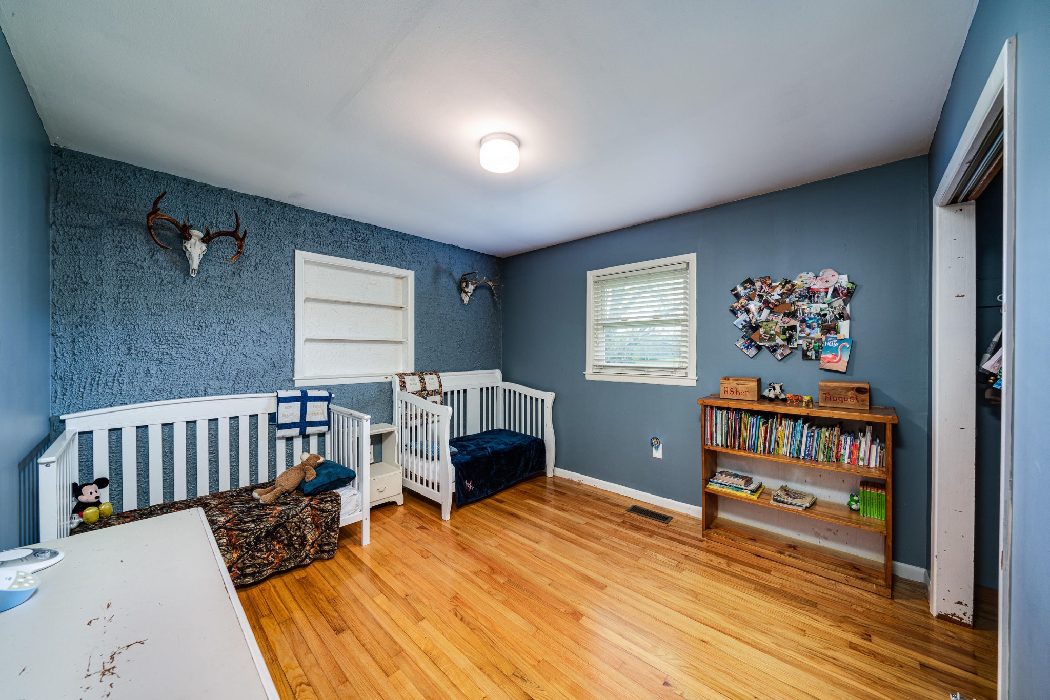144 Meister Hills Road Deer Lodge, TN 37726 - Photo 12 of 40 a bedroom with furniture window and book shelf