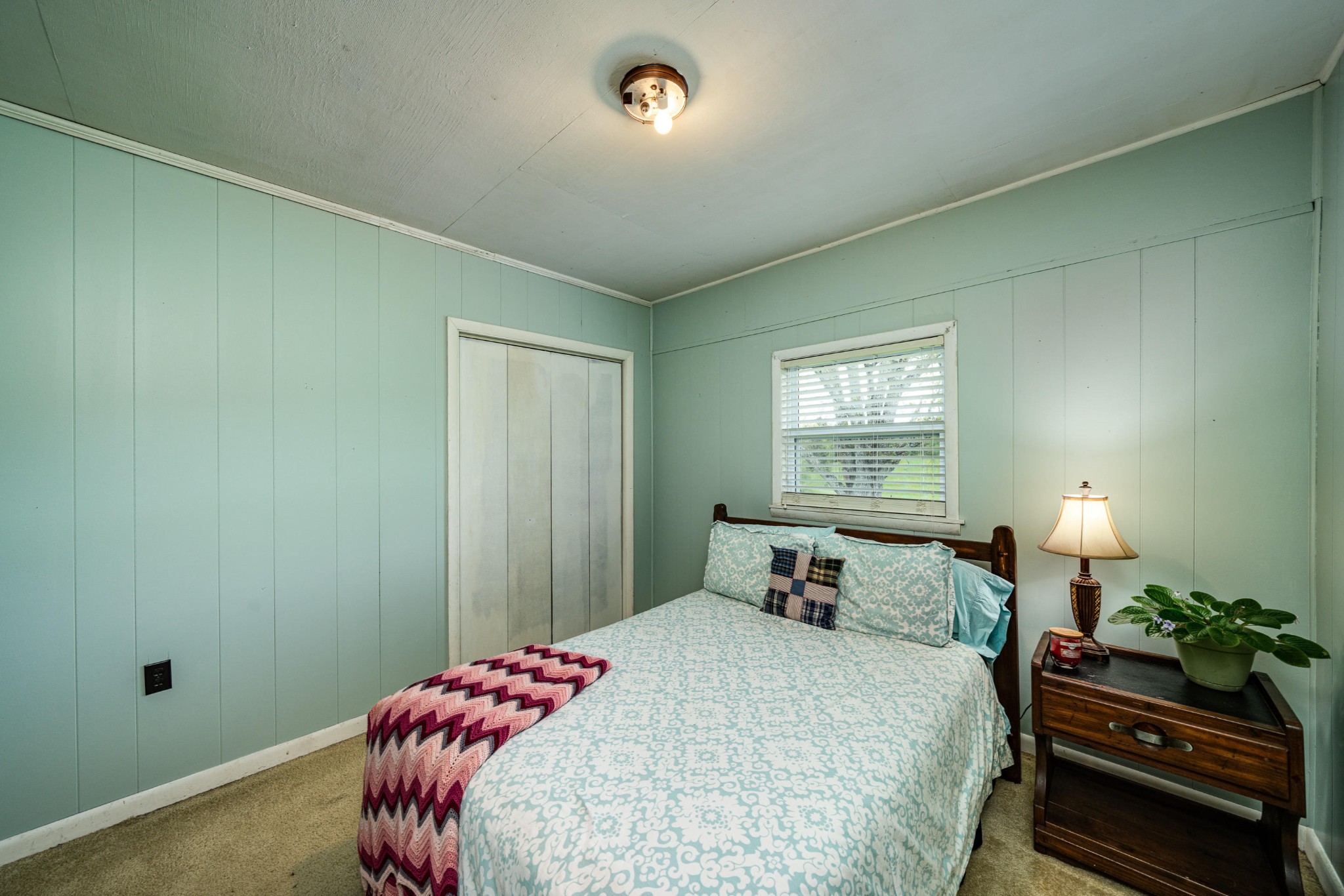144 Meister Hills Road Deer Lodge, TN 37726 - Photo 14 of 40 a bedroom with a bed and window