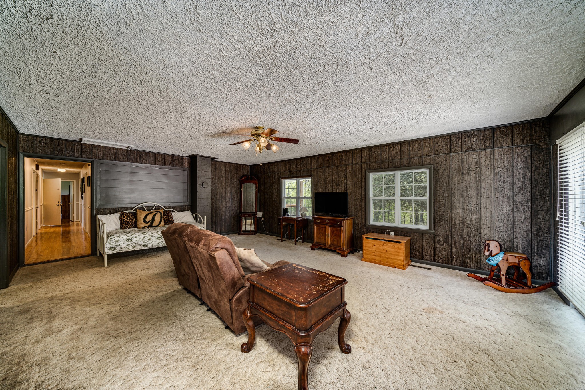 144 Meister Hills Road Deer Lodge, TN 37726 - Photo 18 of 40 a living room with furniture and a flat screen tv