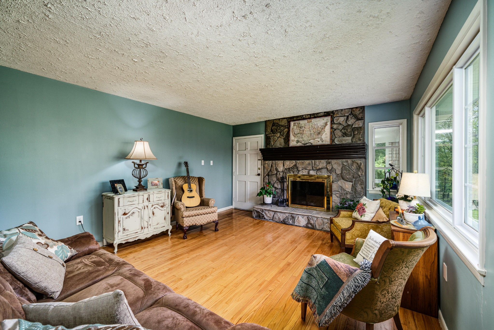 144 Meister Hills Road Deer Lodge, TN 37726 - Photo 3 of 40 a living room with furniture and a fireplace