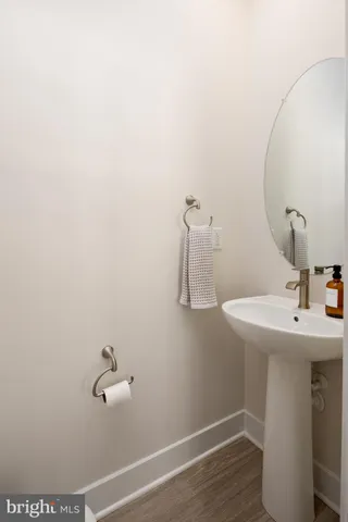 a bathroom with a sink and mirror