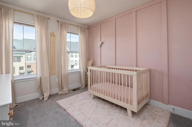 a view of a bedroom with windows